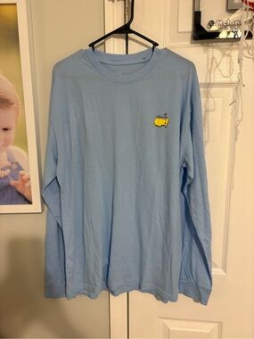 2026 Masters Light Blue Long Sleeve Tee with Yellow Chest Logo